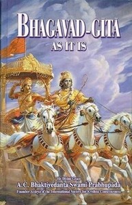 Cover of Bhagavad-Gita As It Is book showing Krishna driving Arjuna’s golden chariot with four white horses.