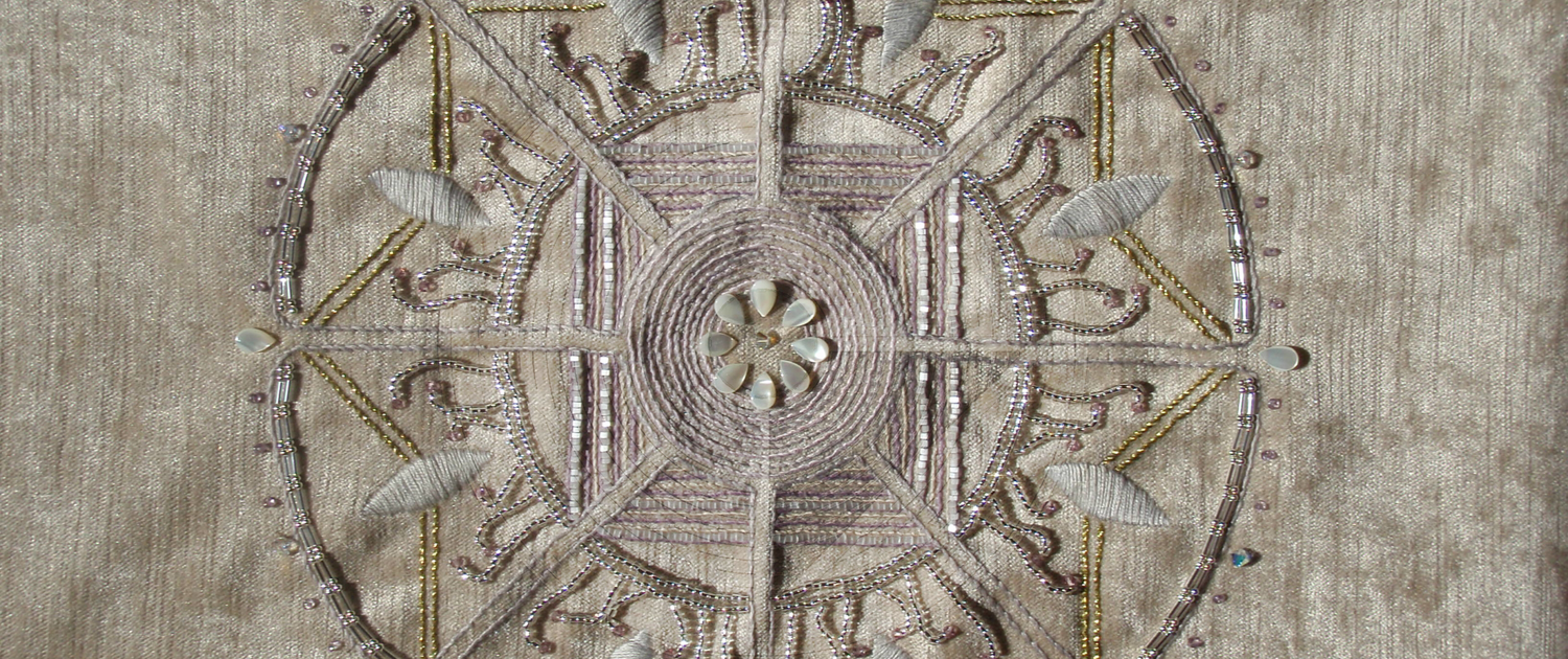 Fig. 0.0.01: The Foundational Pearl, an original 2009 alchemical embroidery representing the first stage of Albedo and the somatic fixing of soul expression into matter.