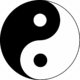 Yin-yang symbol with black on the left and white on the right, displaying circular non-dual geometry.